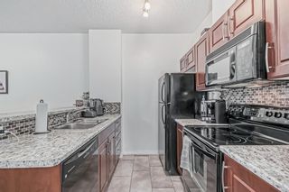 Photo 2: 204 1727 54 Street SE in Calgary: Penbrooke Meadows Apartment for sale : MLS®# A2019680