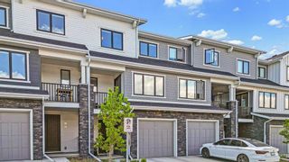 Photo 1: 157 Crestridge Common SW in Calgary: Crestmont Row/Townhouse for sale : MLS®# A2144388