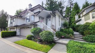 Photo 1: 114 101 PARKSIDE Drive in Port Moody: Heritage Mountain Townhouse for sale : MLS®# R2616146