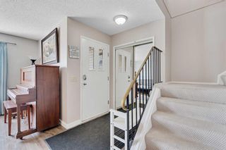Photo 3: 140 Silvergrove Hill NW in Calgary: Silver Springs Row/Townhouse for sale : MLS®# A2123492