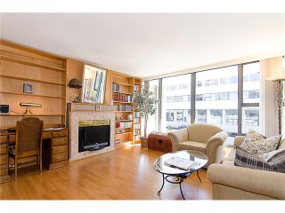 Photo 2: # 207 1633 W 8TH AV in Vancouver: Fairview VW Condo for sale in "FIRCREST GARDENS" (Vancouver West)  : MLS®# V971251