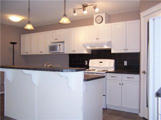 Photo 5: 415 STONEGATE Rise NW: Airdrie Residential Attached for sale : MLS®# C3442625