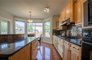 Photo 19: 152 STRATHLEA Place SW in Calgary: Strathcona Park House for sale : MLS®# C4130863