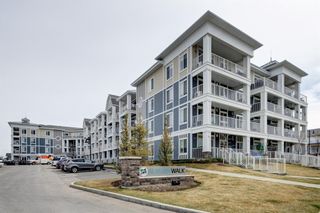 Photo 1: 204 110 Auburn Meadows View SE in Calgary: Auburn Bay Apartment for sale : MLS®# A1216719