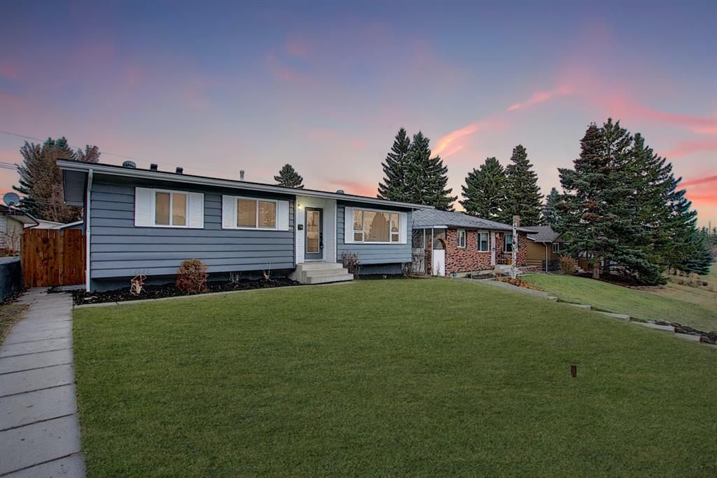 Main Photo: 704 104 Avenue SW in Calgary: Southwood Detached for sale : MLS®# A1045331