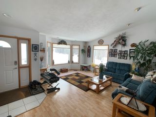 Photo 3: 15 TAZMA Crescent in Fort Nelson: Fort Nelson -Town House for sale : MLS®# R2680771