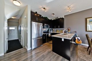 Photo 3: 143 2802 KINGS HEIGHTS Gate SE: Airdrie Row/Townhouse for sale : MLS®# A1009091