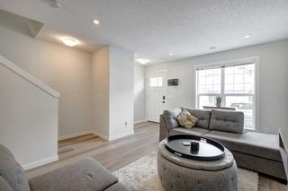 Photo 3: 253 Cranbrook Square SE in Calgary: Cranston Row/Townhouse for sale : MLS®# A2117728