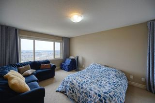 Photo 21: 36 Coulee Park SW in Calgary: Cougar Ridge Detached for sale : MLS®# A2127354