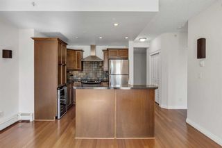 Photo 8: 401 716 5 Street NE in Calgary: Bridgeland/Riverside Apartment for sale : MLS®# A2144353