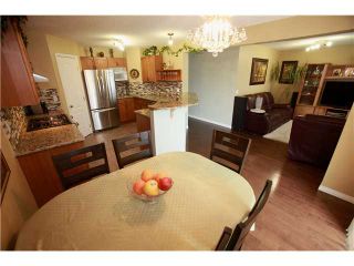 Photo 5: 144 ARBOUR STONE Crescent NW in CALGARY: Arbour Lake Residential Detached Single Family for sale (Calgary)  : MLS®# C3629309