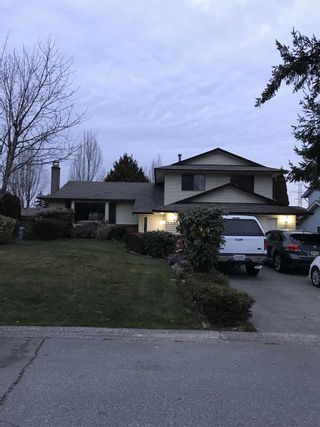 Photo 1: 12489 78A Avenue in Surrey: West Newton House for sale in "WEST NEWTON" : MLS®# R2446996