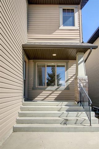 Photo 3: 387 St. Moritz Drive SW in Calgary: Springbank Hill Detached for sale : MLS®# A1185997