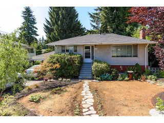 Photo 1: 714 IVY Avenue in Coquitlam: Coquitlam West House for sale : MLS®# V1131997