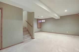 Photo 34: 49 SUN HARBOUR Road in Calgary: Sundance Row/Townhouse for sale : MLS®# A1102875