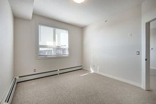 Photo 19: 415 26 Val Gardena View SW in Calgary: Springbank Hill Apartment for sale : MLS®# A1257390