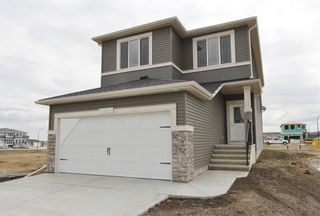 Photo 1: 101 CREEKSTONE Path SW in Calgary: C-168 Detached for sale : MLS®# C4300729