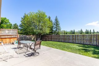 Photo 12: 807 Cannell Road SW in Calgary: Canyon Meadows Detached for sale : MLS®# A1120563