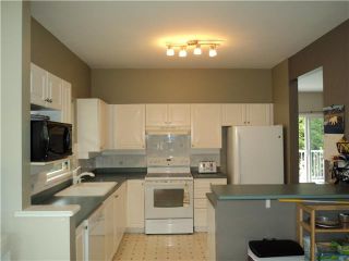 Photo 2: # 18 1765 PADDOCK DR in Coquitlam: Westwood Plateau Condo for sale : MLS®# V1111554