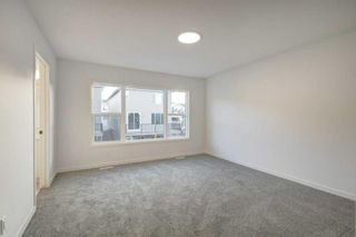 Photo 15: 125 Amblehurst Green NW in Calgary: C-527 Detached for sale : MLS®# A2098783