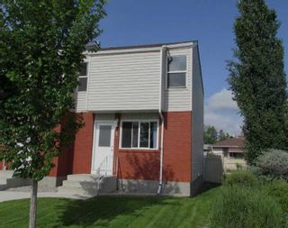 Photo 1: 1 717 1 Street SW: High River Row/Townhouse for sale : MLS®# A2125646