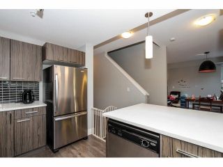 Photo 5: 203 2110 ROWLAND Street in Port Coquitlam: Central Pt Coquitlam Townhouse for sale in "AVIVA ON THE PARK" : MLS®# V1094259
