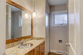 Photo 13: 611 WOODSWORTH Road SE in Calgary: Willow Park Detached for sale : MLS®# C4216444