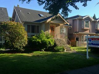 Photo 1: 2336 CHARLES Street in Vancouver: Grandview VE House for sale in "Commercial Drive" (Vancouver East)  : MLS®# V1011947