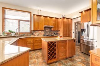 Photo 4: 34 Elveden Drive SW in Calgary: Springbank Hill Detached for sale : MLS®# A2121297