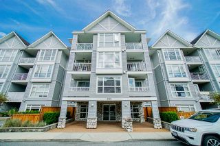 Photo 1: 310 3142 ST JOHNS Street in Port Moody: Port Moody Centre Condo for sale in "Sonrisa" : MLS®# R2469785