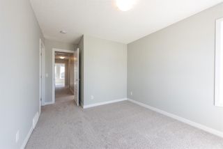 Photo 7: 121 301 REDSTONE Boulevard in Calgary: Redstone Row/Townhouse for sale : MLS®# A1246267