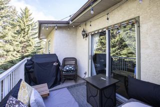 Photo 14: 106 Strathlorne Mews SW in Calgary: Strathcona Park Row/Townhouse for sale : MLS®# A1174641