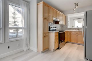 Photo 3: 203 Signal Hill Green SW in Calgary: Signal Hill Row/Townhouse for sale : MLS®# A1070915