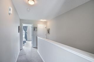 Photo 12: 314 Ascot Circle SW in Calgary: Aspen Woods Row/Townhouse for sale : MLS®# A1111264