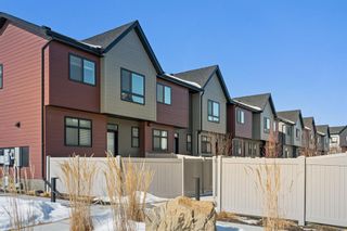 Photo 3: 819 Sage Meadows Gardens NW in Calgary: Sage Hill Row/Townhouse for sale : MLS®# A2034738