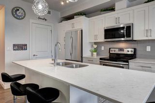 Photo 7: 211 100 Auburn Meadows Common SE in Calgary: Auburn Bay Apartment for sale : MLS®# A2127220