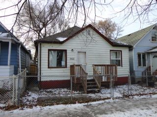 Photo 1: 562 Stella Avenue in Winnipeg: North End Residential for sale (4A)  : MLS®# 202331893