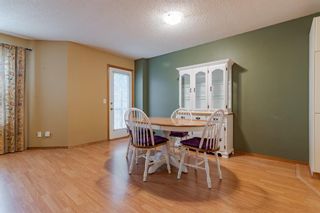 Photo 5: 115 Mt Aberdeen Manor SE in Calgary: McKenzie Lake Row/Townhouse for sale : MLS®# A1147019