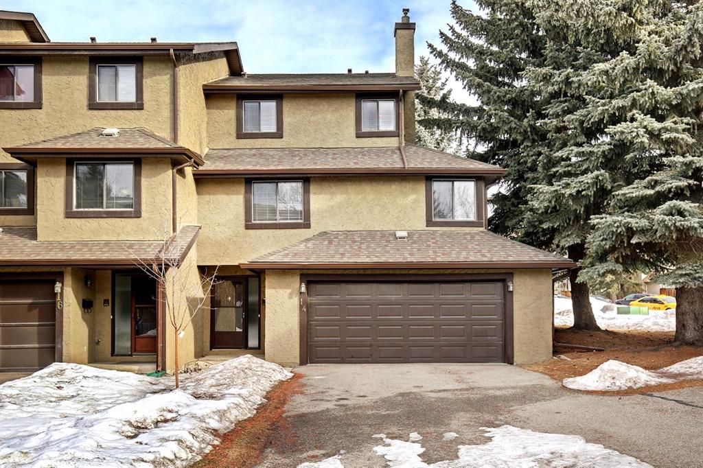 Main Photo: 14 Glamis Gardens SW in Calgary: Glamorgan Row/Townhouse for sale : MLS®# A1076786