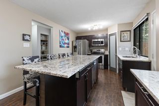 Photo 6: 12 Ranchlands Place NW in Calgary: Ranchlands Row/Townhouse for sale : MLS®# A2054640