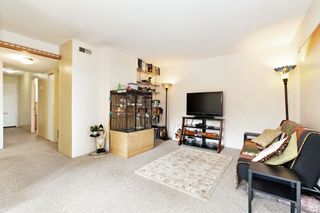 Photo 4: 1015 CLARKE Road in Port Moody: College Park PM Townhouse for sale : MLS®# R2712394