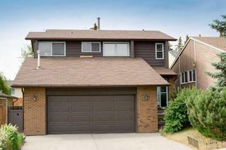 Photo 1: 116 Strathcona Close SW in Calgary: Strathcona Park Detached for sale : MLS®# A2054996