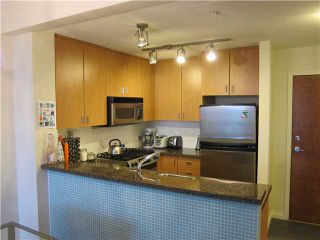 Photo 4: # 402 6888 SOUTHPOINT DR in Burnaby: South Slope Condo for sale in "CORTINA" (Burnaby South)  : MLS®# V939033
