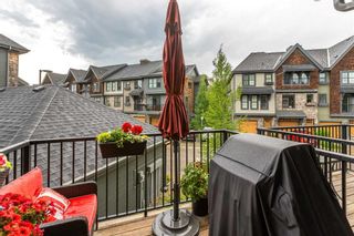 Photo 11: 311 Ascot Circle SW in Calgary: Aspen Woods Row/Townhouse for sale : MLS®# A2058217