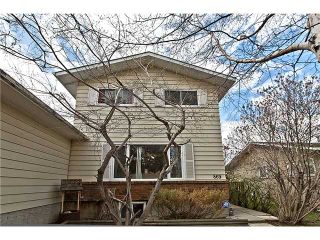 Photo 1: 869 QUEENSLAND Drive SE in CALGARY: Queensland Residential Attached for sale (Calgary)  : MLS®# C3616074