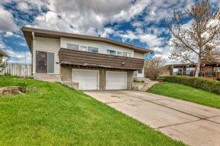 Main Photo: 6717 - 6719 Huntsbay Road NW in Calgary: Huntington Hills Full Duplex for sale : MLS®# A2132547