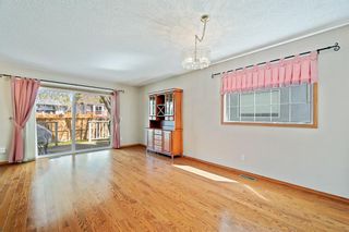 Photo 3: 41 Sun Harbour Road SE in Calgary: Sundance Row/Townhouse for sale : MLS®# A1218017
