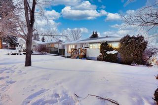 Photo 1: 108 Harlow Avenue NW in Calgary: Highwood Detached for sale : MLS®# A2030572