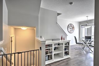 Photo 11: 114 Hillcrest Gardens SW: Airdrie Row/Townhouse for sale : MLS®# A1215843