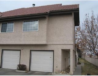Photo 1: 402 1997 SIROCCO Drive SW in CALGARY: Signature Parke Townhouse for sale (Calgary)  : MLS®# C3358974